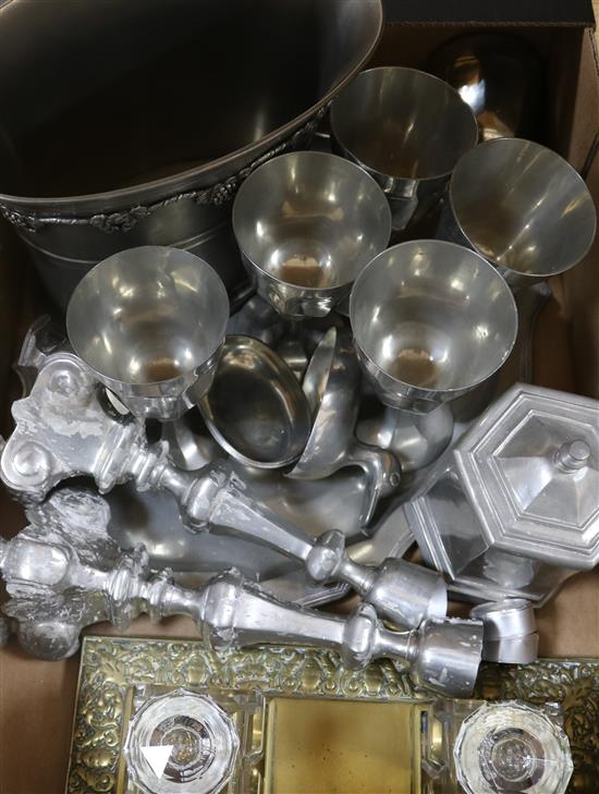 A pewter bowl, candlesticks, ice buckets, etc.